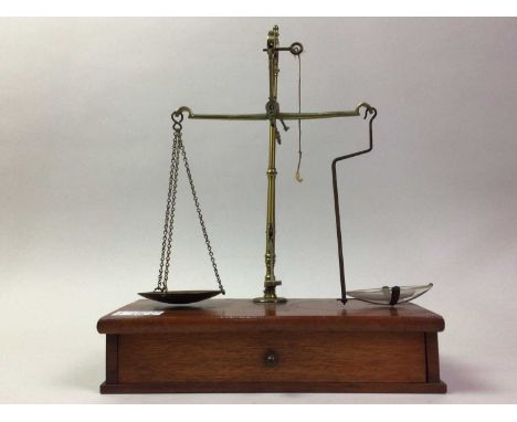 TWO SETS OF MEASURING SCALES, along with a brass mortar and pestlelarger scales 27cm wideQty: 3