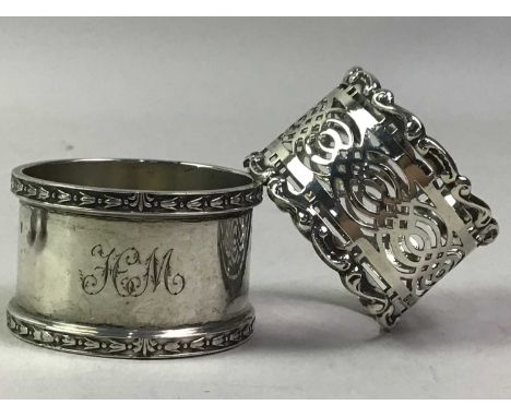 GROUP OF SILVER, comprising two napkin rings, two spoons and a pair sugar tongsQty: 133g