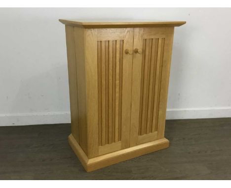 TWO LIGHT OAK UNITS, with two doors73cm wideQty: 2Good overall condition with no obvious damage.  82cm high,  61cm wide, 39cm