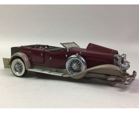 FOUR FRANKLIN MINT PRECISION MODEL CARS, including 1930 Duesenberg J Derham Tourer, 1935 Duesenberg J550, 1938 Alvis 4.3 Litr