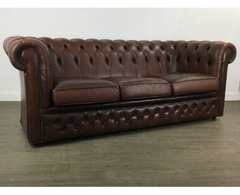 BROWN LEATHER THREE SEATER CHESTERFIELD SOFA, WITH MATCHING ARMCHAIR on castors72cm high, 185cReasonable overall condition.  