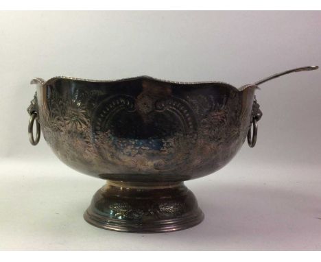 PLATED PUNCH BOWL, ALONG WITH A SOUP LADLE the bowl embossed with floral designs and with lion head and ring handles, on a sp