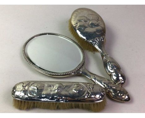SILVER THREE PIECE DRESSING TABLE SET, WILLIAM COMYNS, LONDON 1901 in the Reynold's Angels pattern, comprising mirror, clothe
