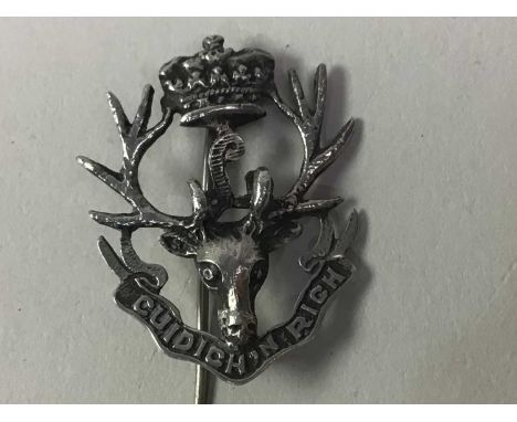 GROUP OF SILVER BROOCHES one modeled as a stag