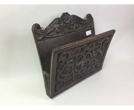 CELTIC REVIVAL CARVED OAK PAPER RACK, AND A SMALL JOINT STOOL the stool of Queen Anne designthe paper rack 36cm wideQty: 2