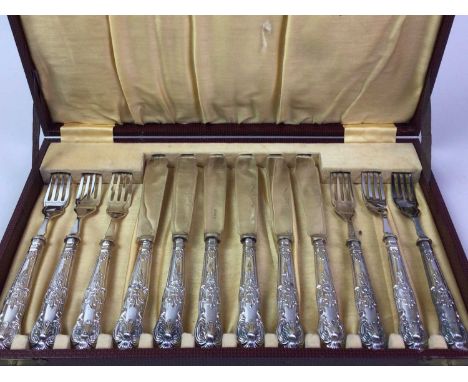 GEORGE V SET OF SILVER HANDLED FORKS AND KNIVES, C H BEATON, SHEFFIELD 1928 embossed with scrolls and foliage, cased