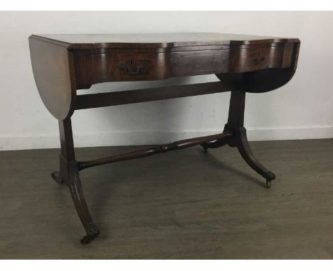 REGENCY STYLE MAHOGANY SOFA TABLE, LATE 19TH/EARLY 20TH CENTURY of shaped outline with three frieze drawers, the swept suppor