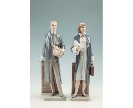 A PAIR OF SPANISH LLADRO PORCELAIN FIGURES, modelled as male and female barristers in standing position, 36cm high 