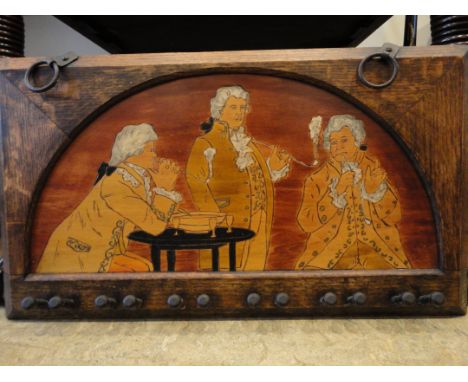 A PENWORK AND STAINED TIMBER COAT RACK, decorated with three gentlemen smoking pipes, 56.5 x 32cm, together with a stained wo