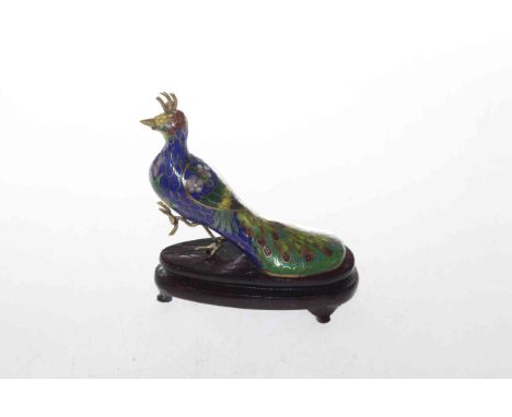 Cloisonne enamel model of a peacock on wooden stand