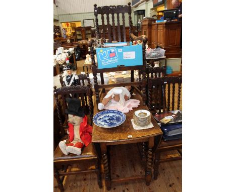 Oak barley twist gate leg dining table and five chairs (four single and one carver)