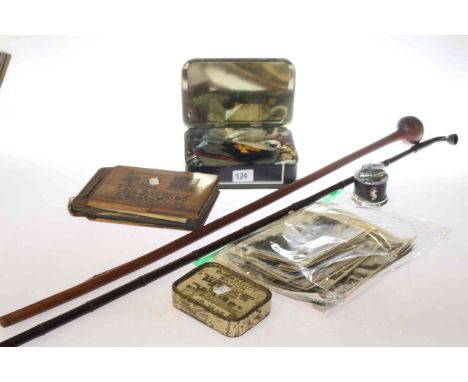 Photographs, military badges, buttons, sticks, table lighter, emergency ration tin, etc