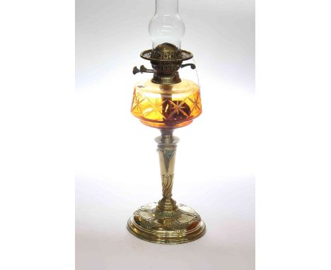 Edwardian brass oil lamp with inset green cabochons