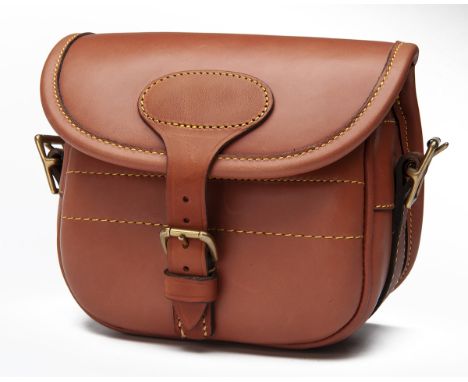 FREDERICK BEESLEYA NEW AND UNUSED TAN LEATHER SUEDE-LINED SMALL CARTRIDGE BAG,with canvas and leather shoulder strap, brass f