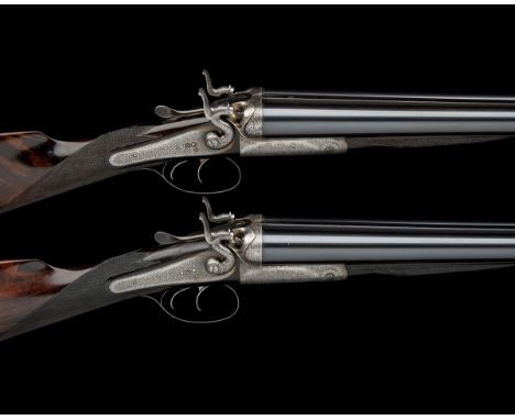 MADE FOR THE PARIS EXHIBITION J. PURDEY & SONSA FINE PAIR OF 12-BORE TOPLEVER HAMMER EJECTOR GUNS, serial no. 13213 / 4,30in.