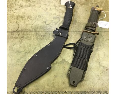 Kukri Knife with 25cm long blade by "Cold Steel, USA", rubber grips, complete with black leather scabbard: Along with a hunti