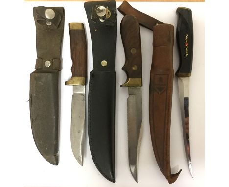 A collection of three general purpose hunting knives: one Finnish knife by "Normark" with 16cm single edged blade marked "Fis