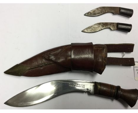 A private purchase small sized Kukri knife with 15cm maker marked blade "KB Hakuri &amp; Sons, Ghoon, Darjeeling". Brass bols