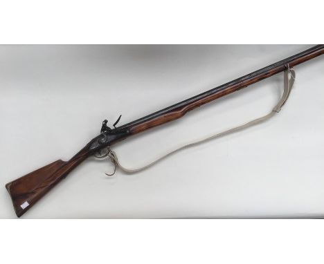 Flintlock Musket with 45.5 inch barrel. BP Proof mark. Action a/f. Overall length 61.5 inches. Brass butt plate and trigger g