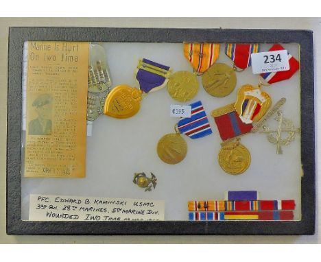 Iwo Jima U.S. Marine Purple Heart Casualty group to Edward. B. Kaminski. Scarce grouping from a soldier who served in this pi
