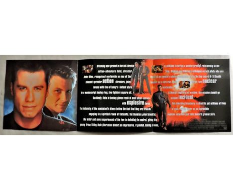 Film Brochure: Broken Arrow, 1996, 10" by 10", opens out to triple page spread. One side of the complete spread features a sy