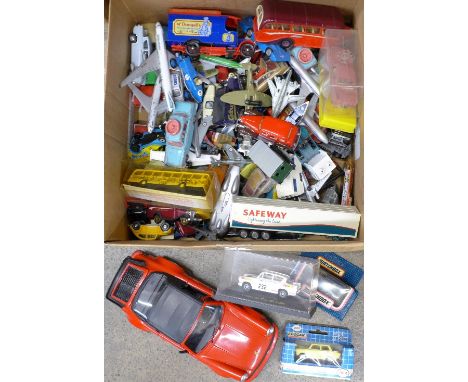 A collection of die-cast model vehicles including Matchbox, Dinky and Corgi