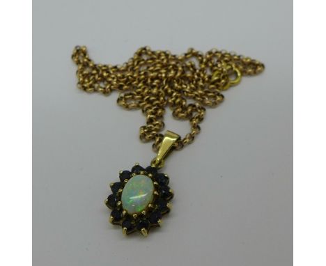 A 9ct gold, opal and sapphire pendant and chain, 3.4g