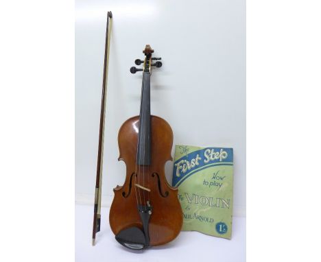 A copy of an Antonius Stradivarius violin and bow, cased, length of back excluding button, 33.5cm