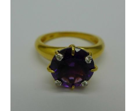 A silver gilt, amethyst and diamond cluster ring, R