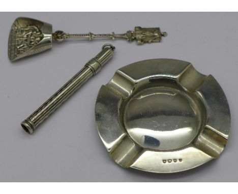 A Dutch silver spoon, a silver pencil holder and a silver ashtray
