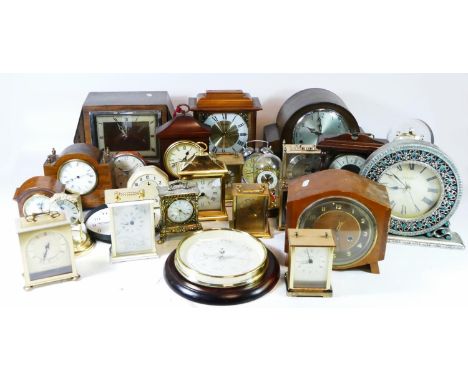A collection of manual wind and quartz clocks, to include traveling alarm clocks and miniature novelty clocks (boxed) (4) 