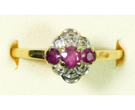 A 9ct gold ruby and diamond cluster ring, O, 1.3gm 