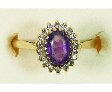 A 9ct gold amethyst and diamond cluster ring, stone rubbed, K, 1.9gm 