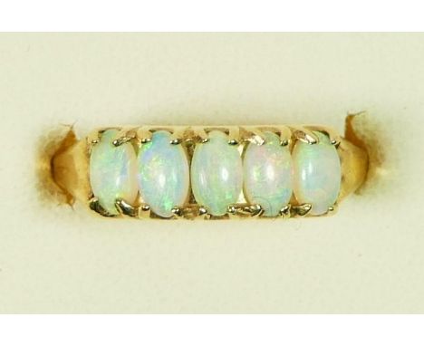 A 9ct gold five stone opal ring, N, 2.6gm 