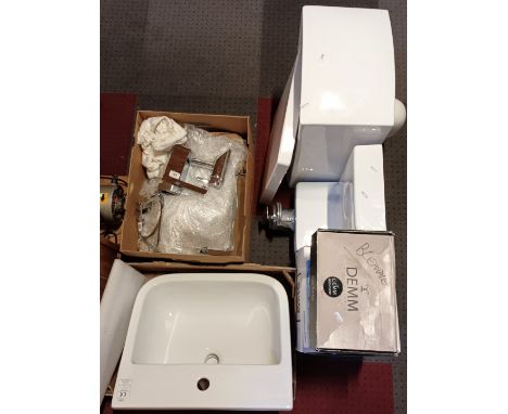 A ceramic toilet bowl, toilet seat, sink base with attached taps, a sink basin, sets of taps and others 