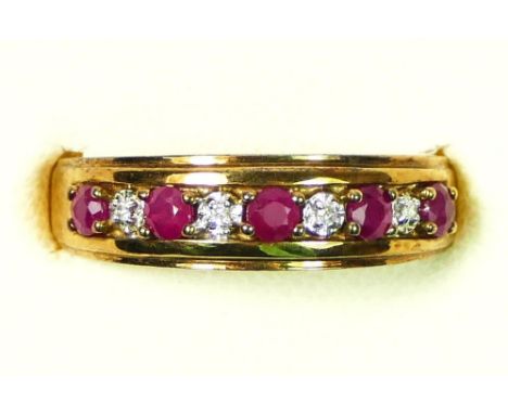 A 9ct gold ruby and diamond half eternity ring, N, 2.4gm 