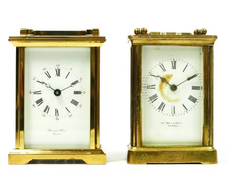 An English 8 day carriage clock, brass case with bevel edge glass panels, housing a jewelled movement inscribed 'Made In Engl
