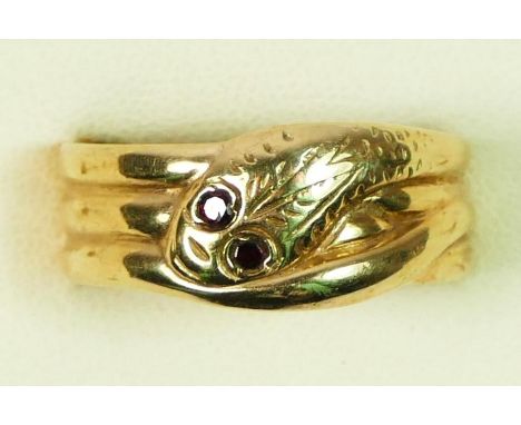 A vintage 9ct gold coiled snake ring, Birmingham 1985, garnet set eyes, X, 5.6gm 