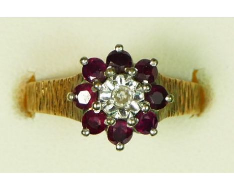 A 9ct gold ruby and diamond cluster ring, N, 3.4gm 