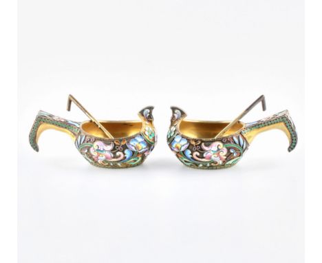 A pair of silver ladles - cloisonne enamel saltcellars with spoons. Identical decorative program of painted enamels, made on 