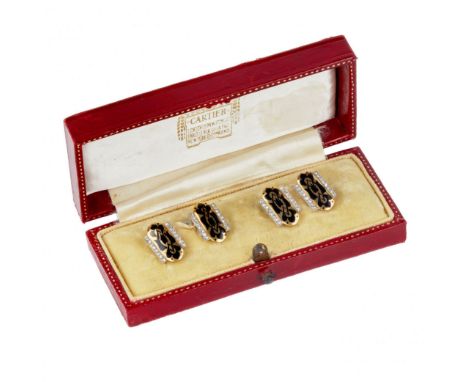 Gold Cartier cufflinks with champlevé enamel mirror decoration and diamond borders. They are connected by a gold chain with F