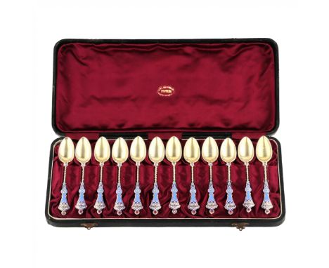 A set of 12 elegant silver teaspoons of champlevé enamel in the neo-Russian style in the original case of the Grachev′s Facto