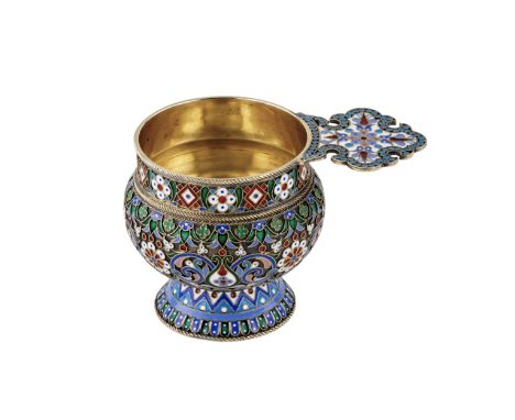 Russian silver glass of cloisonné enamel. Ovchinnikov. Repeats the shape of a brother, with a flat horizontal handle in the f