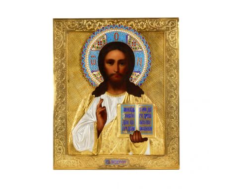 Festive and expressive icon of the Almighty in a silver, gilded frame, with combined enamels. Decorative ensemble is achieved