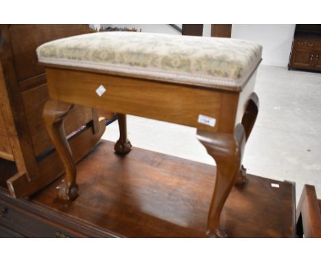 An early 20th Century mahogany Queen Anne style piano stool