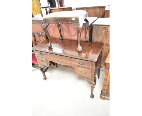 An early 20th Century mahogany dressing table and similar tapestry seated footstool