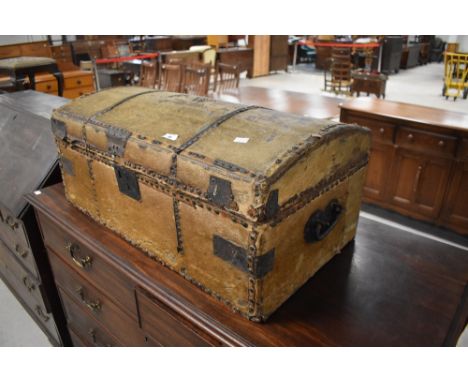 A 19th Century hide storage trunk having domed top, width approx. 76cm