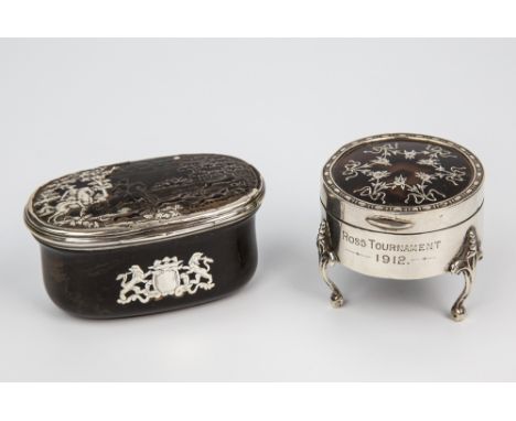  An 18th century tortoiseshell and silver snuff box oval form, the pressed tortoiseshell lid with silver overlay, depicting a