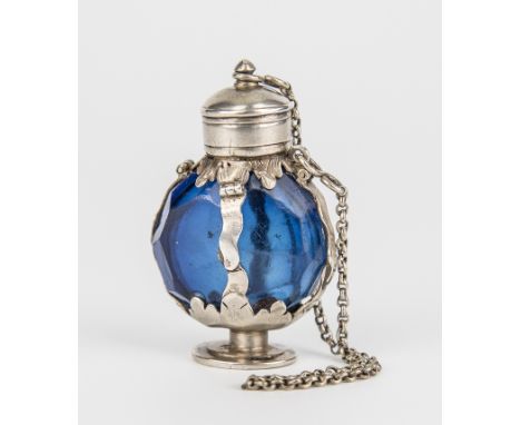  An antique silver and blue glass 'pilgrim flask' scent bottle probably 18th century, Continental, unmarked, the facet cut bo