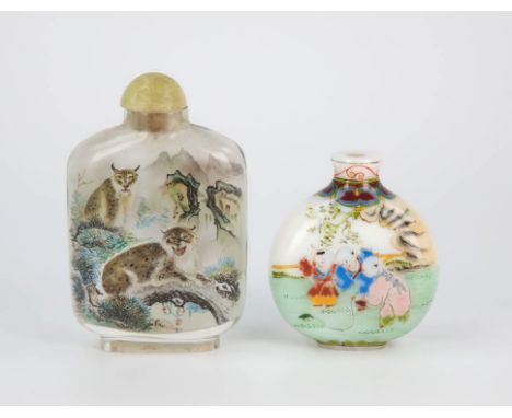 A Chinese inside painted snuff bottle of rectangular form with rounded shoulders, front panel showing two Lynx amongst the br